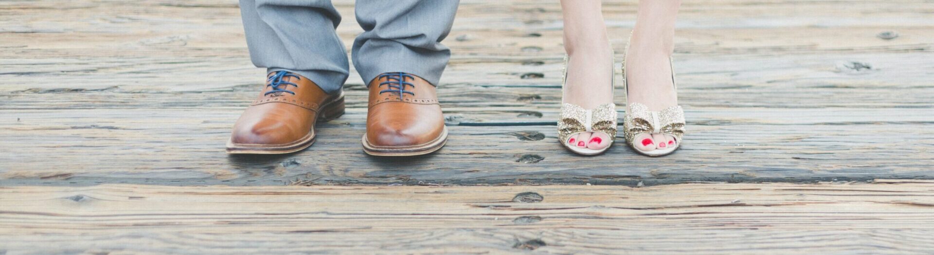 A set of male feet and a set of female feet - wedding photo