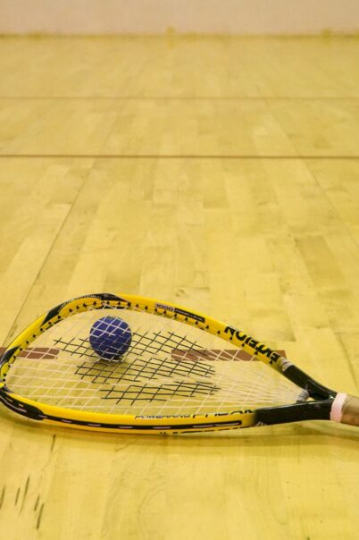 Squash court with racket and ball
